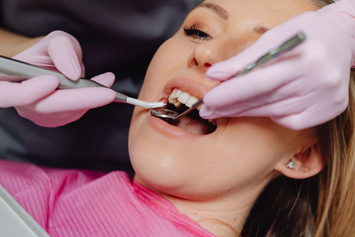 Happy patient receiving a personalized dental consultation